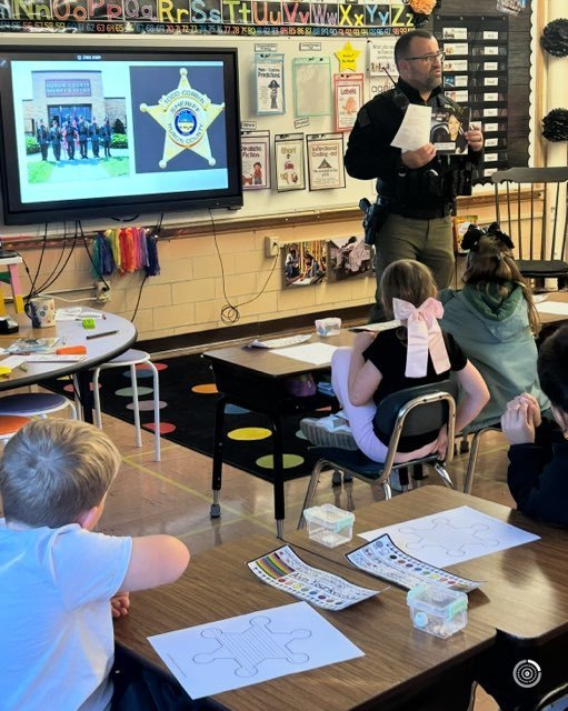 Mrs. Cannon's 1st grade students at Maplehurst Elementary School spent the week learning about community helpers and even created their own cardbox box community buildings! A big thank you to our special visitors who brought their learning to life:  Mike Conney - Huron County Sheriff's Office Kristin Sabbato - Fisher Titus Registered Nurse Nick Shullick - Norwalk Sanitation Department  Dan Strayer and Kevin McGraw - Norwalk Fire Department Michelle Mancuso - Huron County Humane Society   Our students loved learning how these community helpers keep Norwalk safe, clean, and cared for! 