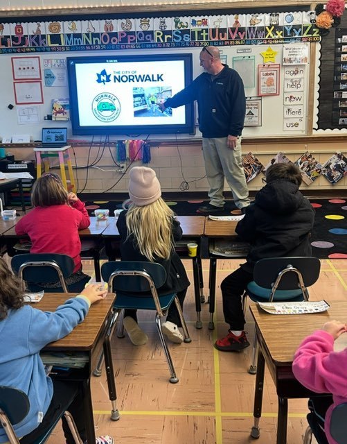 Mrs. Cannon's 1st grade students at Maplehurst Elementary School spent the week learning about community helpers and even created their own cardbox box community buildings! A big thank you to our special visitors who brought their learning to life:  Mike Conney - Huron County Sheriff's Office Kristin Sabbato - Fisher Titus Registered Nurse Nick Shullick - Norwalk Sanitation Department  Dan Strayer and Kevin McGraw - Norwalk Fire Department Michelle Mancuso - Huron County Humane Society   Our students loved learning how these community helpers keep Norwalk safe, clean, and cared for! 