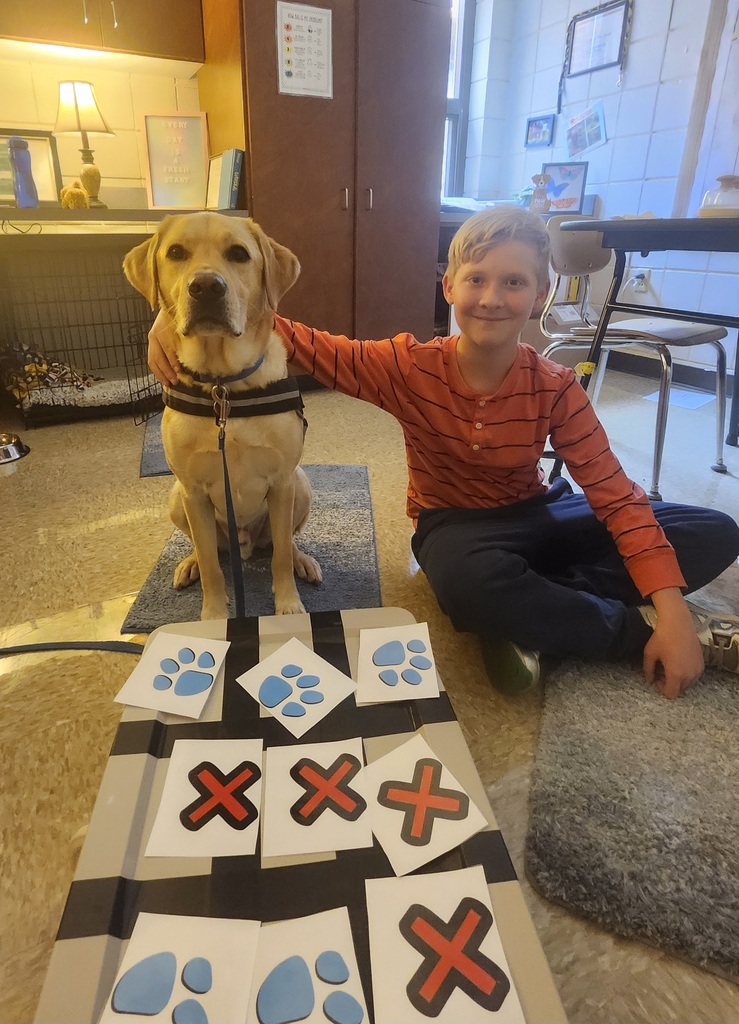 “October was a busy month for 6th grade. They had Red Ribbon week with an assembly I was a part of and tons of red tickets for being so positive. That means I also get some special times with students. We played fetch, tic-tac-toe, walked through the halls, and got my beautiful face on some pictures for students to take home. We have started November out doing great things and I see a lot of smiling faces too with students and staff. That really makes my day. I sure am glad to be a part of Norwalk!” ~ Kepler, School Facility Dog