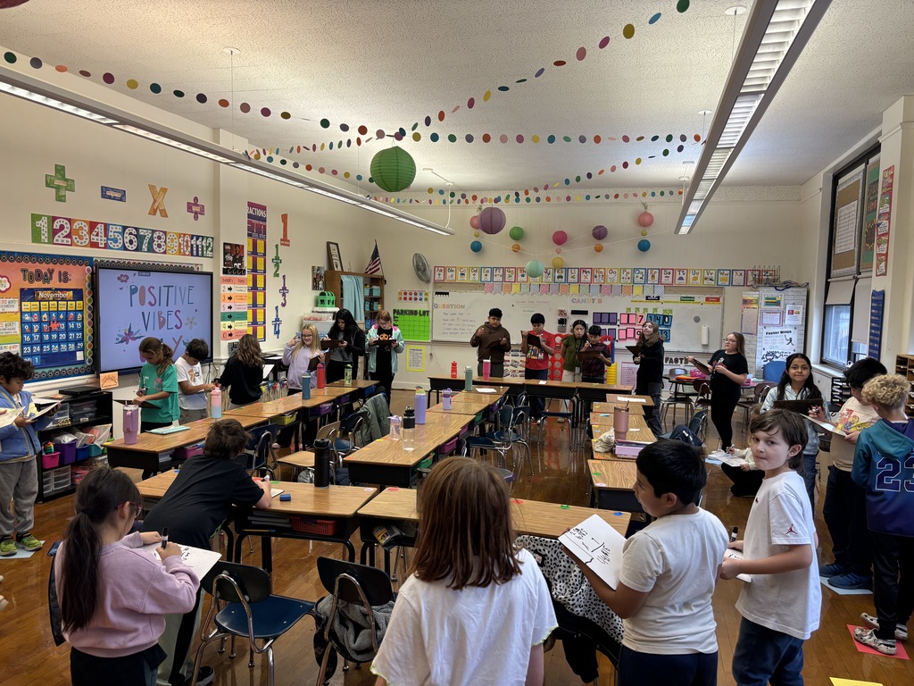 Mrs. Baker’s class using movement and music during math class to review multiplication!