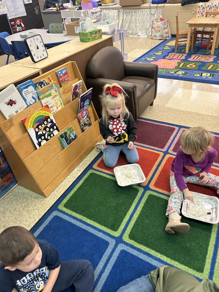 Preschool students from Mrs. Golden and Mrs.Lesch’s class had a guest visitor, Mrs.Jude, come to class and talk about dinosaurs. The first lesson a couple of weeks ago, the students learned the names of dinosaurs, what they ate and how big they really were. She brought  a life size paper foot of a T-Rex and the students each put one shoe inside the foot to see how many shoes it would take to fill it. Fridays lesson enabled them to be paleontologists, each student used a brush and toothpick to dig for dinosaur bones, each student excitedly and successfully found a dinosaur! Thank you to Mrs. Jude for a fun and educational experience. 