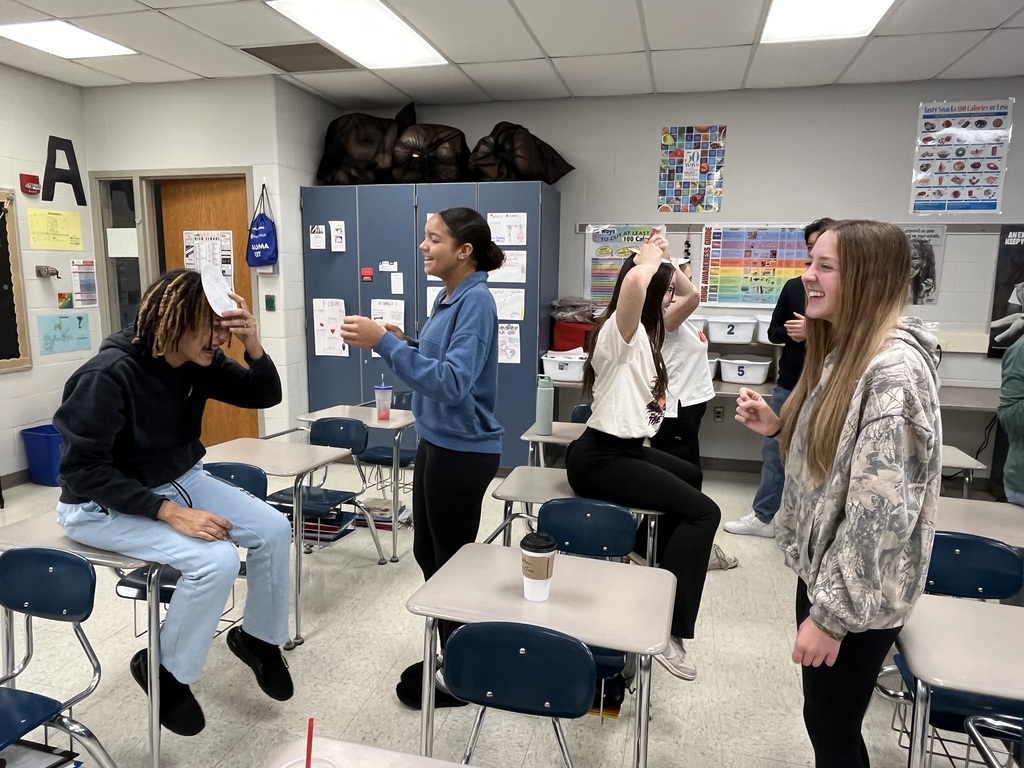 Students had some fun in Health class before Thanksgiving break. They worked in communication skills to describe a picture for their partner to draw without looking