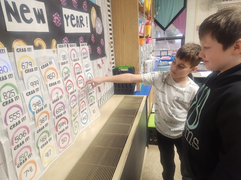 We have been learning about how to round to the nearest 10 and 100.  One of the students' favorite games to play is called Grab It, where I say a number and what it rounds to and they have to try to be the first one to "grab" it from the chart.  The first one to grab it wins the round.  Teams with the most points at the end of the game wins.  We have also been continuing to work on memorizing our multiplication facts.  I included a few pictures of students quizzing each other on their facts. Students are working on earning an ice cream party at the end of the year by memorizing each of their time tables.