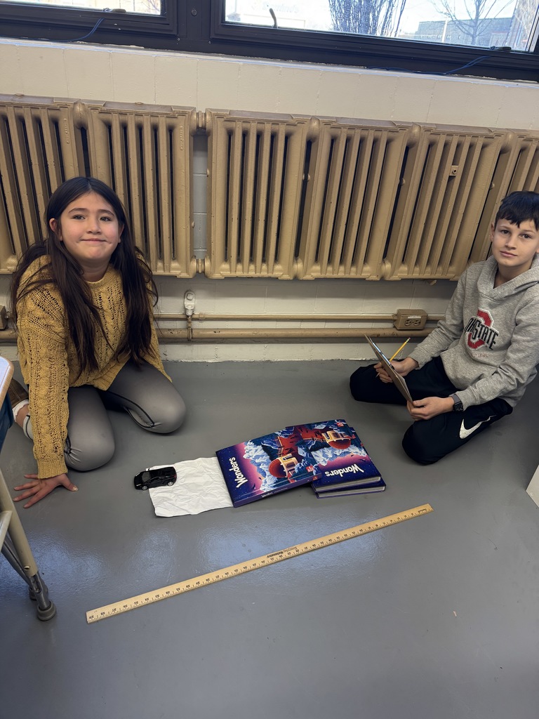 Mrs. Valentine's fifth graders have been learning about force and motion since returning from winter break.  This week they've been focused on friction, which is a force that acts against motion.  Today students started a toy car friction lab that will help them compare how different surfaces affect motion.