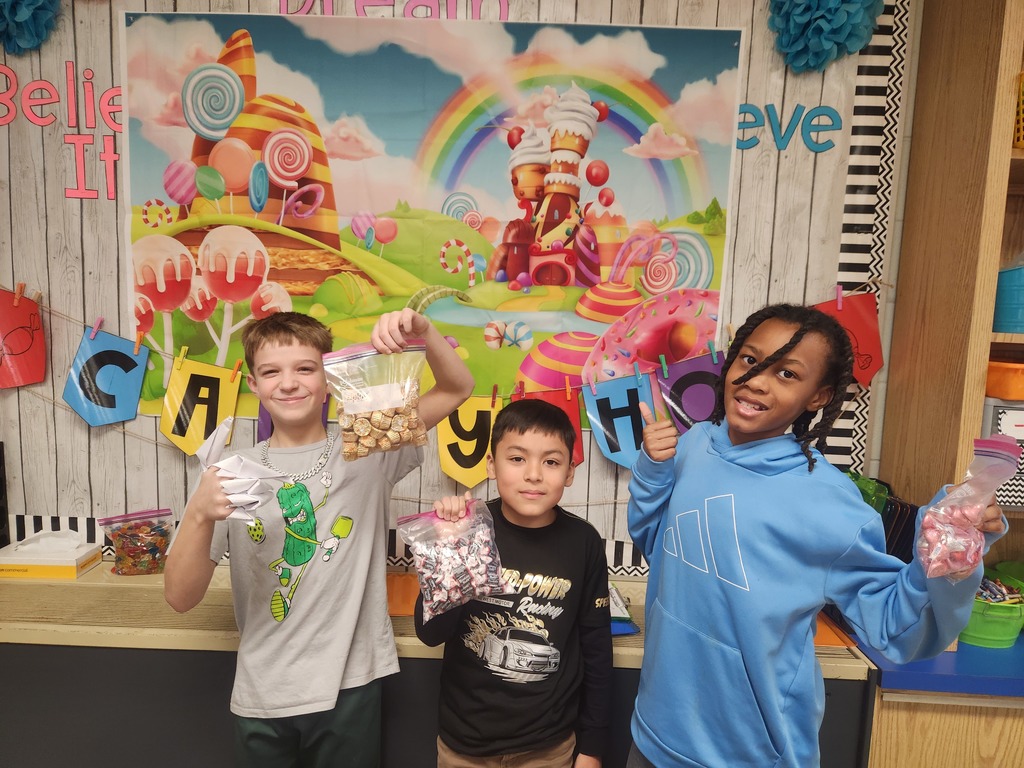 Third grade students recently completed 10 candy themed challenges in math to wrap up our chapter on rounding.  After completing the challenges, students were able to give their best "estimate" for the amount of candy in each bag. The student with the closest estimate without going over was the winner of that candy!
