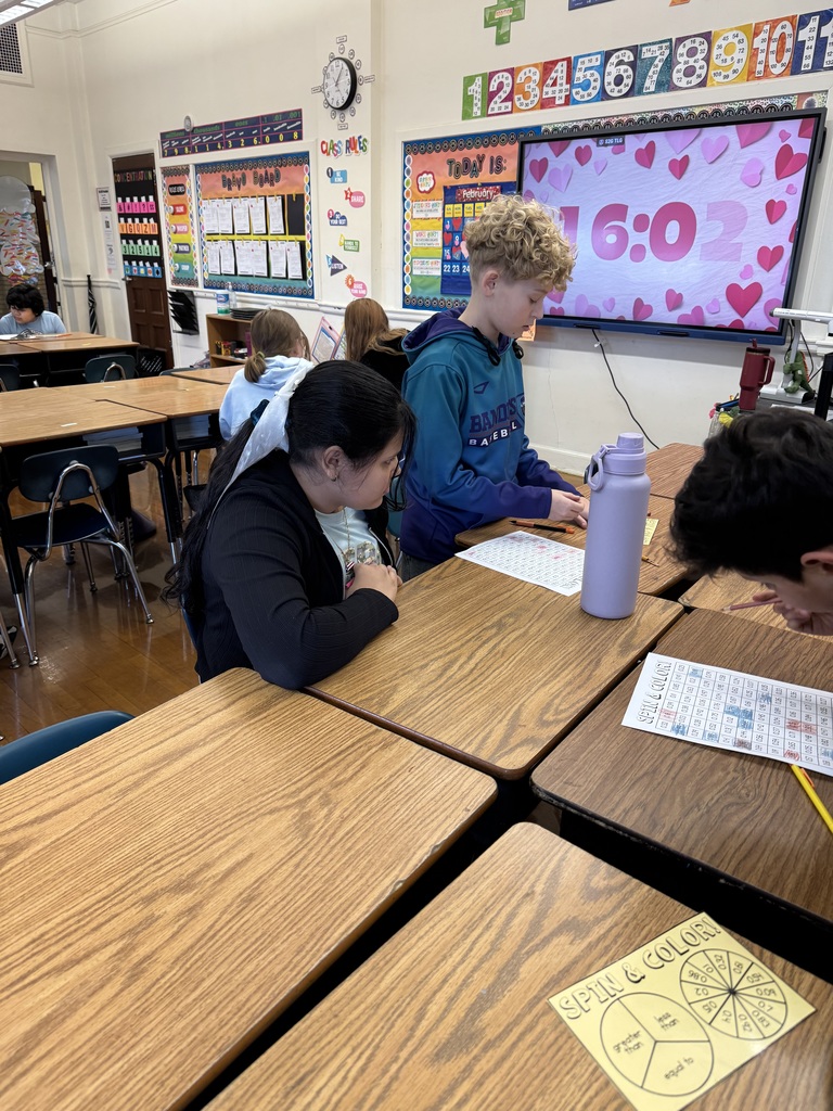 Mrs. Baker’s class using games to learn and practice comparing decimals. 