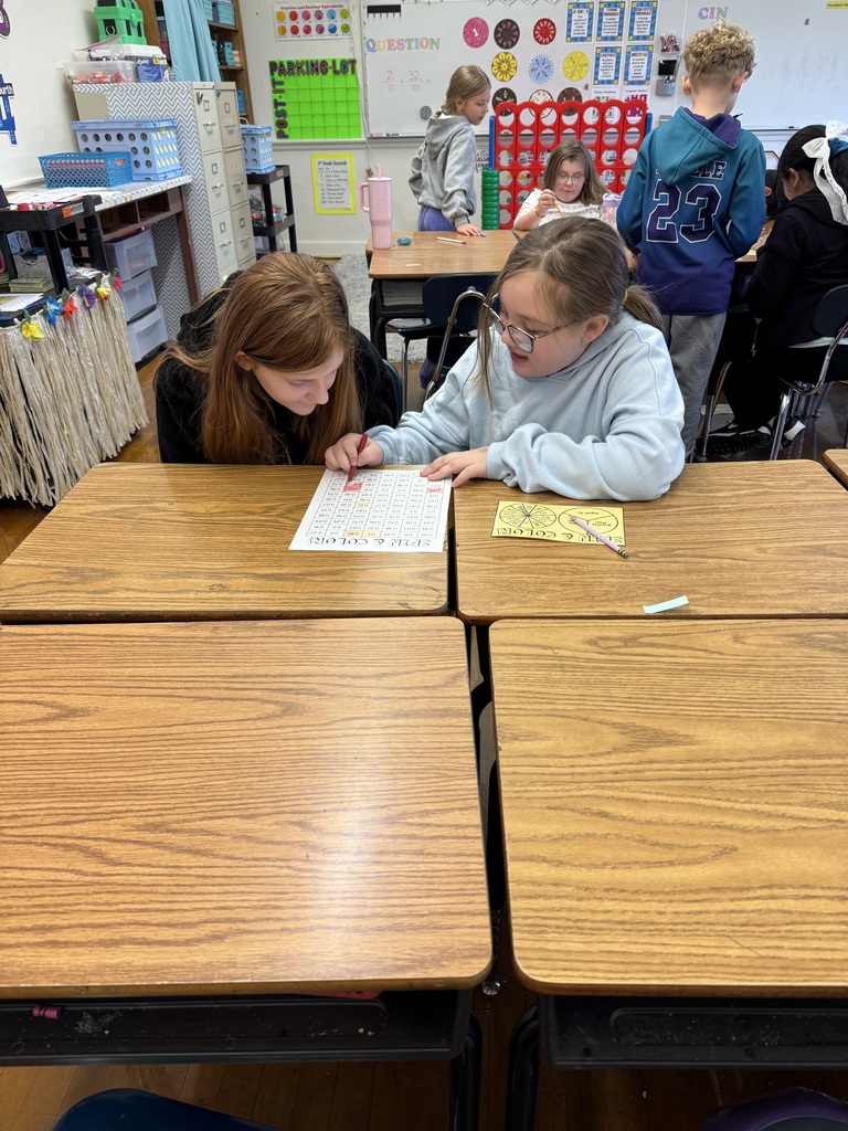 Mrs. Baker’s class using games to learn and practice comparing decimals. 