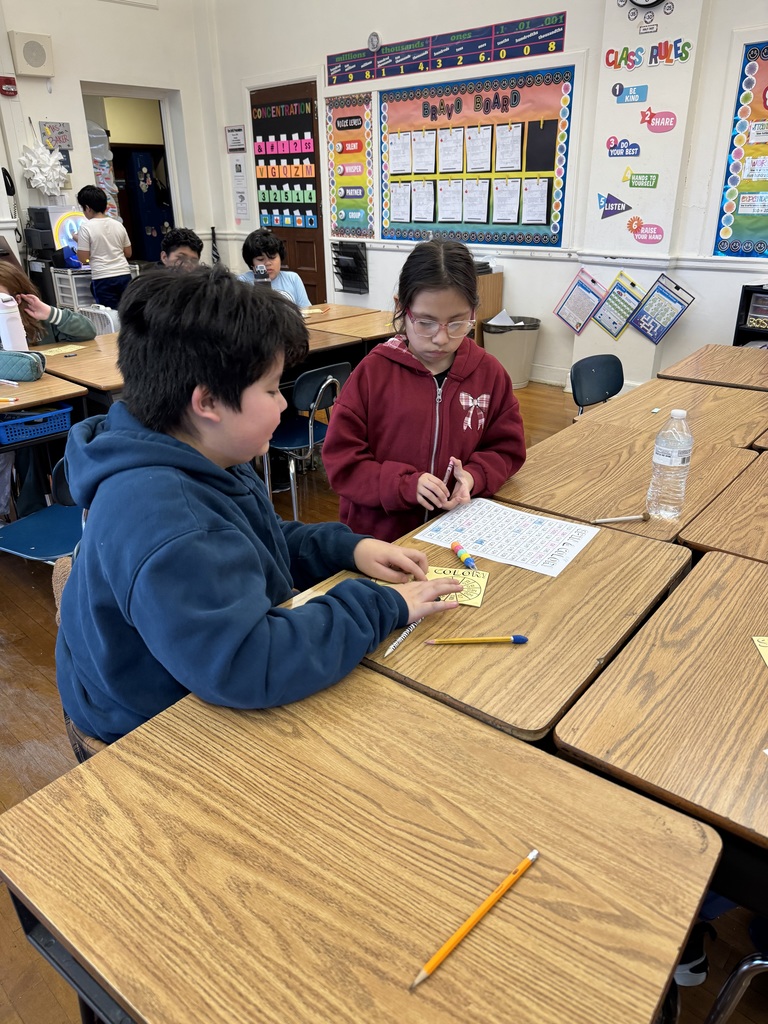 Mrs. Baker’s class using games to learn and practice comparing decimals. 