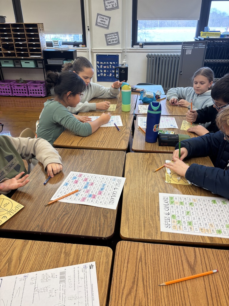 Mrs. Baker’s class using games to learn and practice comparing decimals. 