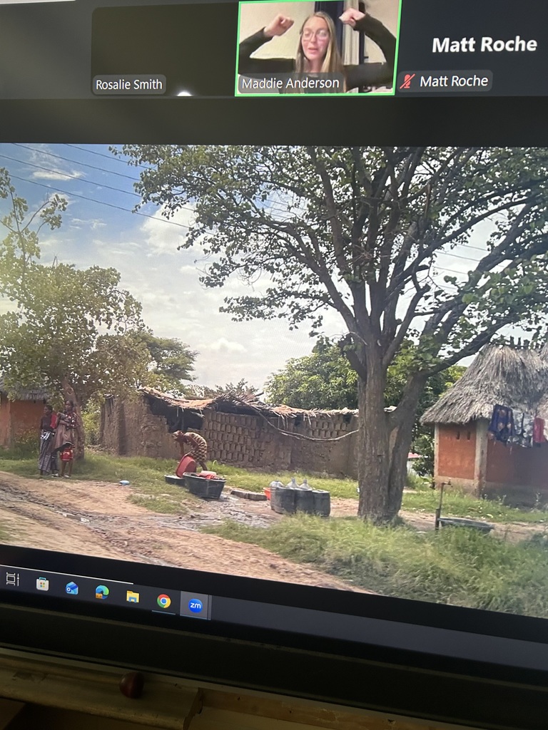 Maplehurst Elementary is celebrating right to read week with a theme of "book an adventure". Guest readers are coming in each day to read to the students in their classrooms. First grade students in Mrs. Kingsborough's class went on an adventure to Africa! Former Norwalk resident Maddie (Roche) Anderson lives in Africa with her husband. Maddie read to the students today via zoom from Africa.  Maddie read a story her dad wrote when she was little and her sister illustrated it. Because Africa is eight hours ahead of us, it was 10:30 at night there so Maddie shared pictures she had taken with the students.  She spoke to them about the weather, the landscape, the animals, the currency and the foods they eat.  The students were not excited about the idea of eating bugs-which is something people in Africa eat.  A student asked Maddie why they eat bugs and she responded that many people in Africa are poor and cannot afford to buy food and bugs are free.  The students were attentive and engaged and asked many good questions. We are grateful to have had this opportunity. 