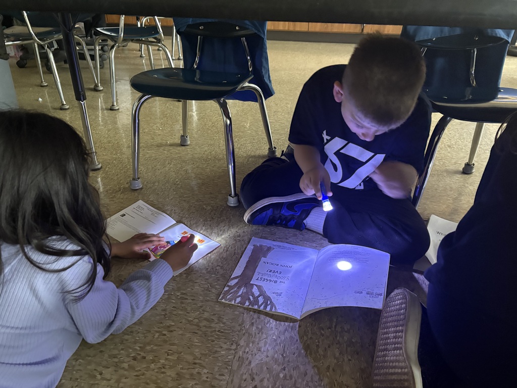 Maplehurst students in Mrs. Caitlyn Cannon's class had a very special reader from Ecuador-Ell assistant Wenddy Riems'  daughter lives there and she writes children's books.  Andrea Rivadeneira wrote the book "Lulu and Ellie:Days of Nerves".  She read this book to the first graders from Ecuador.  Miss Kaitlyn Smith's kindergarten class had a guest reader from Africa-Maddie Roche Anderson, formerly from Norwalk, read to her students on Friday.  She read a story her dad wrote when she was a child. Students had the opportunity to ask questions and learn more about Africa and Ecuador-we are grateful for these amazing opportunities.  Friday was flashlight friday and each student was given a flashlight to use to read "in the dark" in their classrooms.  Miss Kaitlyn Smith's students were caught reading under their desks.