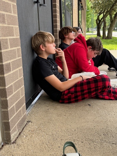 When it’s hot in the building, you take the books outside and read in the shade!! NMS Literature classes