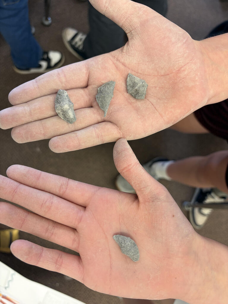 Mrs. Bergman’s science class became paleontologists during a fossil dig using shale from Sylvania, Ohio! Students discovered real fossils including brachiopods, coral, and other ancient marine life hidden inside the rocks. This activity helped students learn about fossils, sedimentary rocks, and how Ohio was once covered by an ancient sea hundreds of millions of years ago. The best part — students were able to keep the fossils they found! 