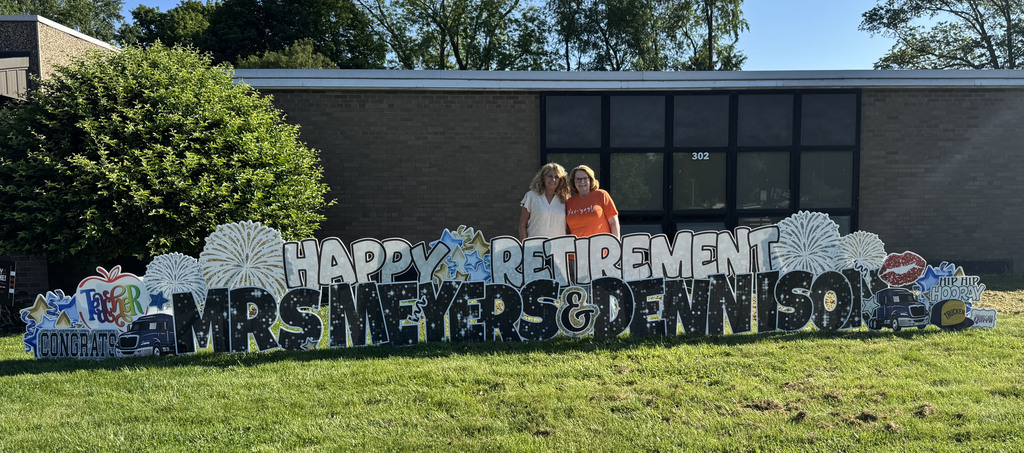 2 women with retirement sign
