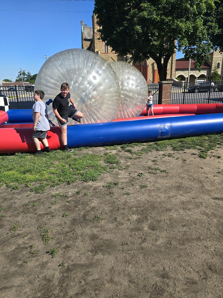  pictures of students on the inflatables