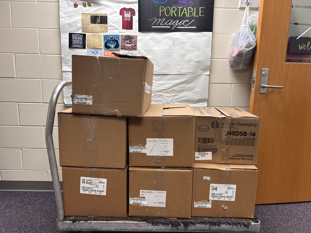 boxes of books on a cart