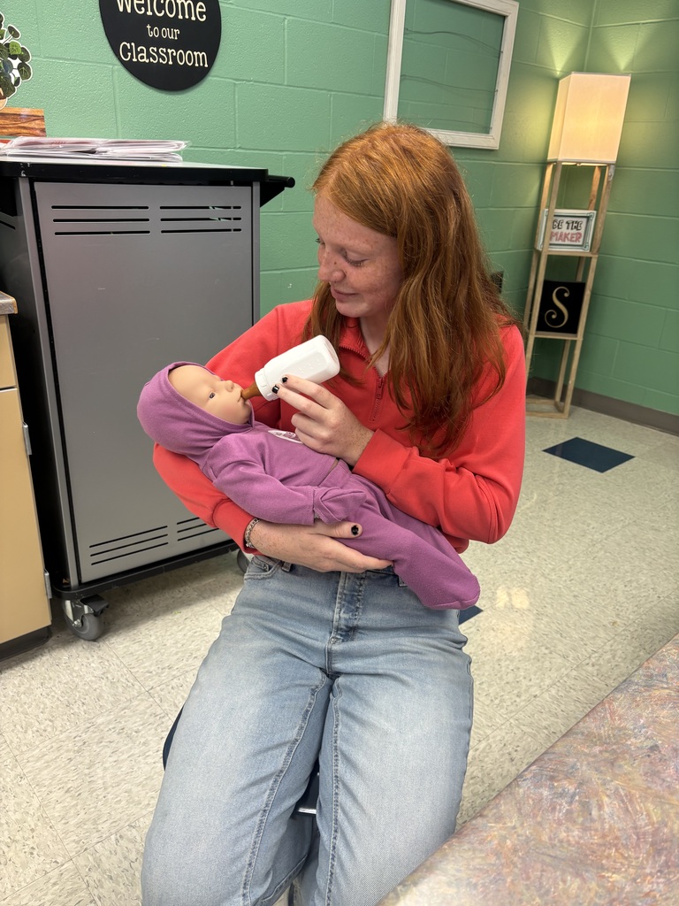 Students in Family Dynamics classes have been going through the "Real Care Baby" training. They are learning about the needs of an infant and childhood development. Soon they will be taking the babies home, where they will have to care for the infants for a weekend. The infants are programed to cry, need fed, changed, and soothed.