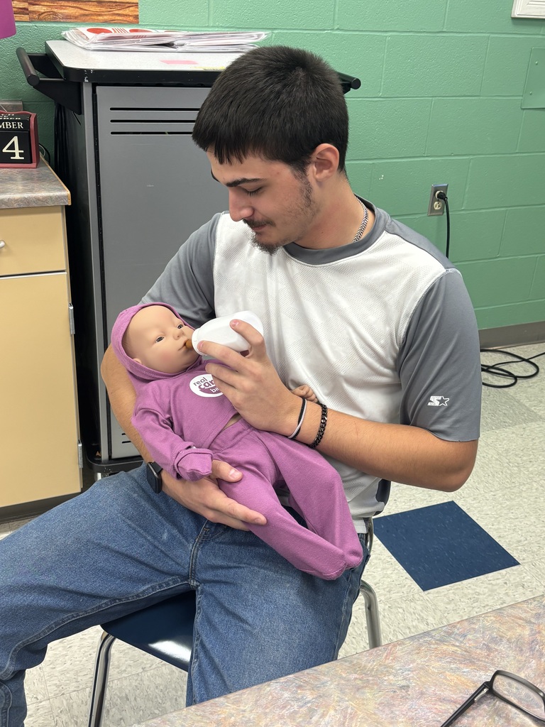 Students in Family Dynamics classes have been going through the "Real Care Baby" training. They are learning about the needs of an infant and childhood development. Soon they will be taking the babies home, where they will have to care for the infants for a weekend. The infants are programed to cry, need fed, changed, and soothed.