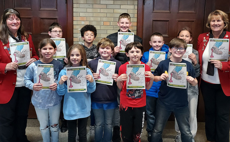 kids with coloring books