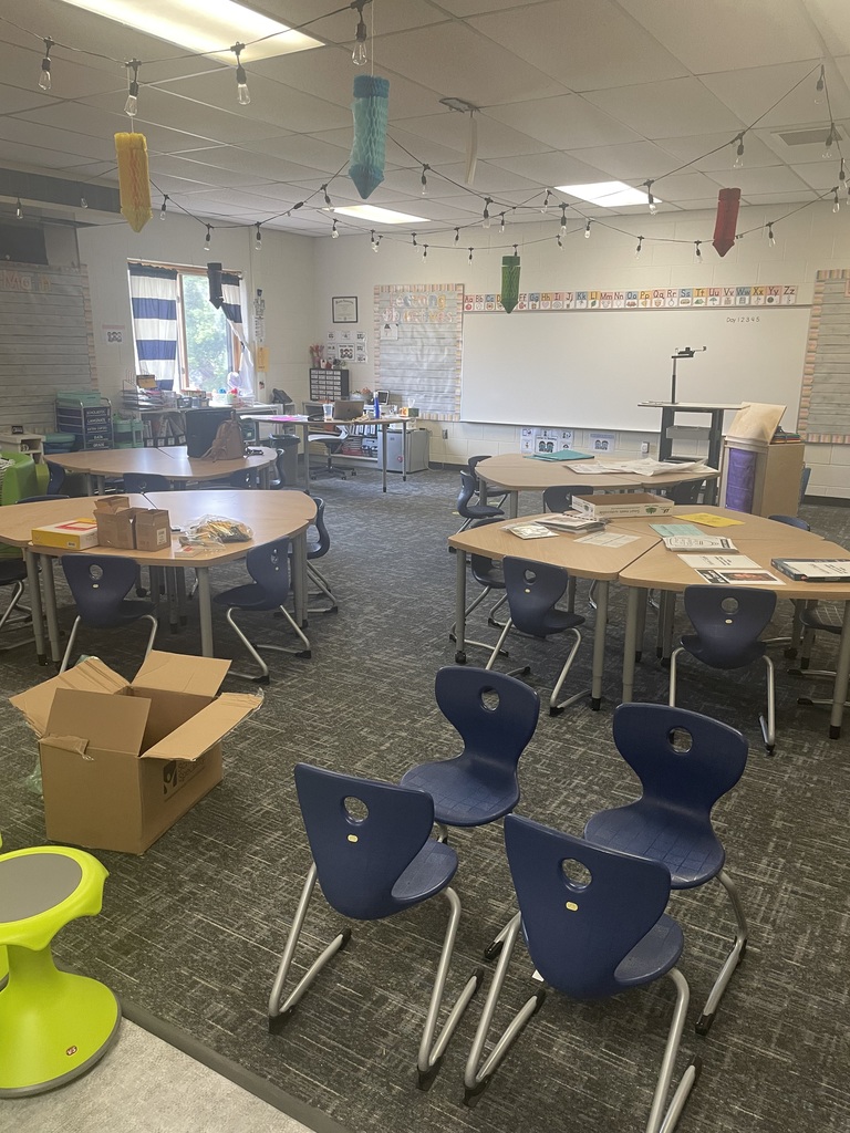 Classroom getting set up with new tables and chairs