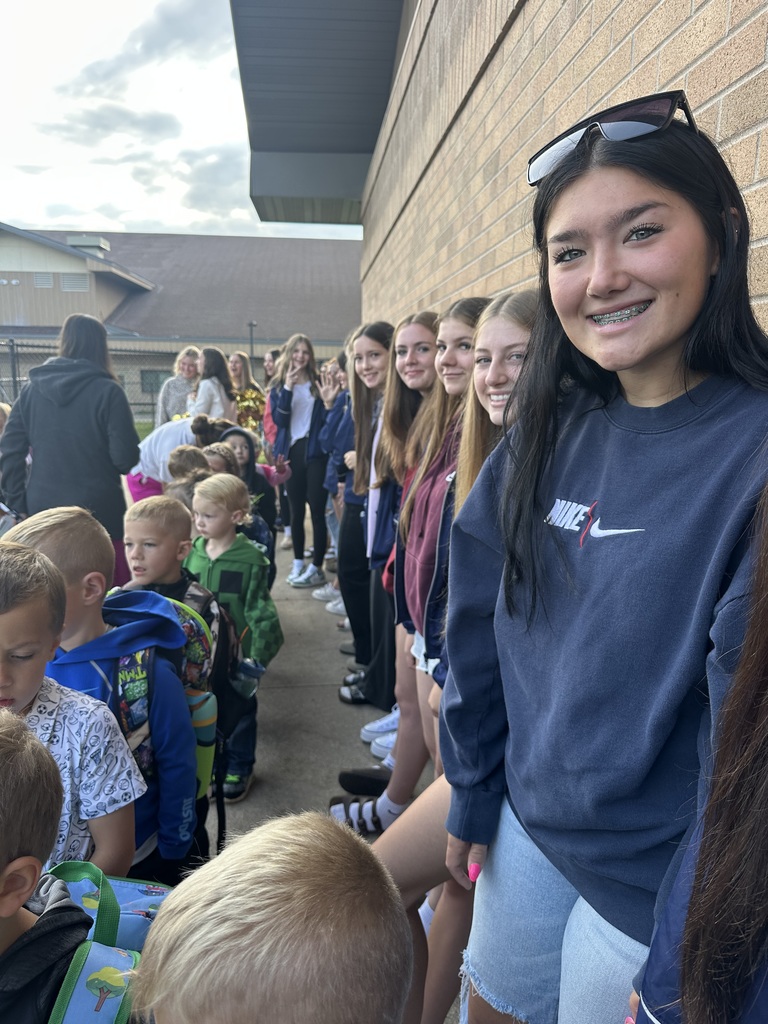 Athletes welcoming the students to school!