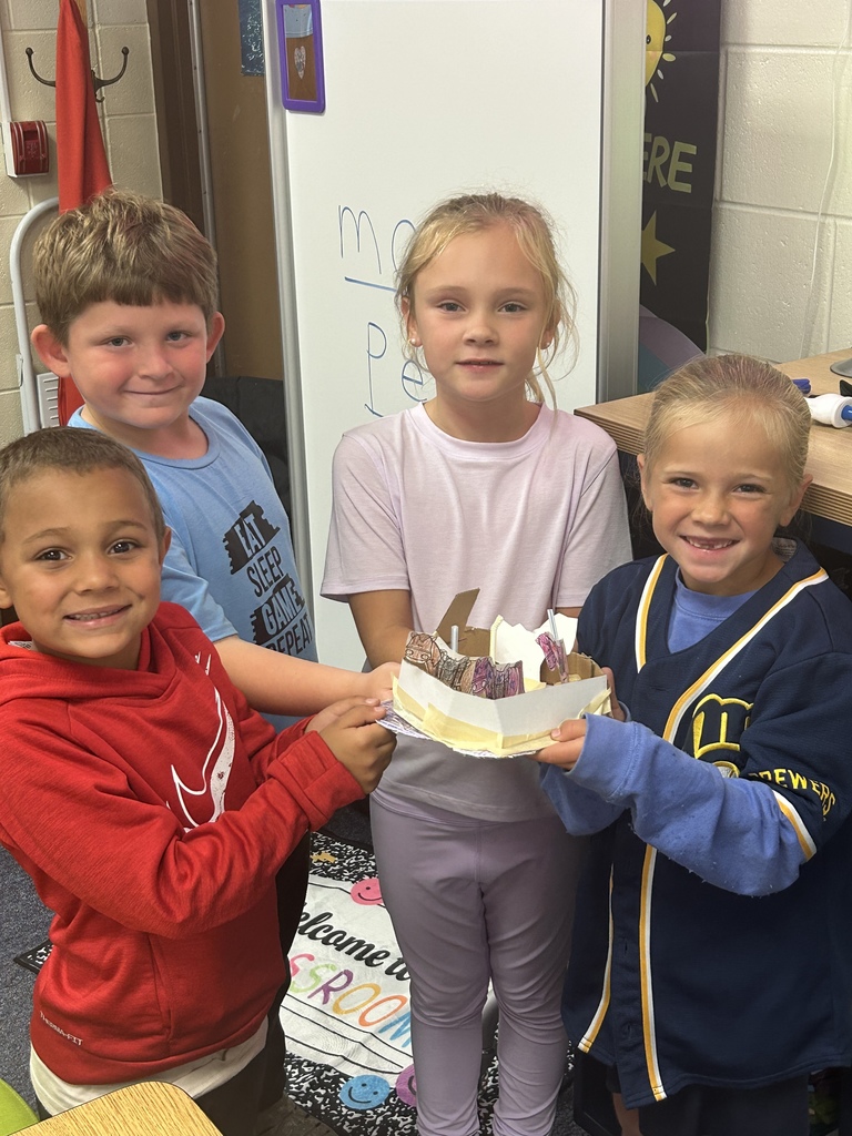 First Grade Kids building carousel project