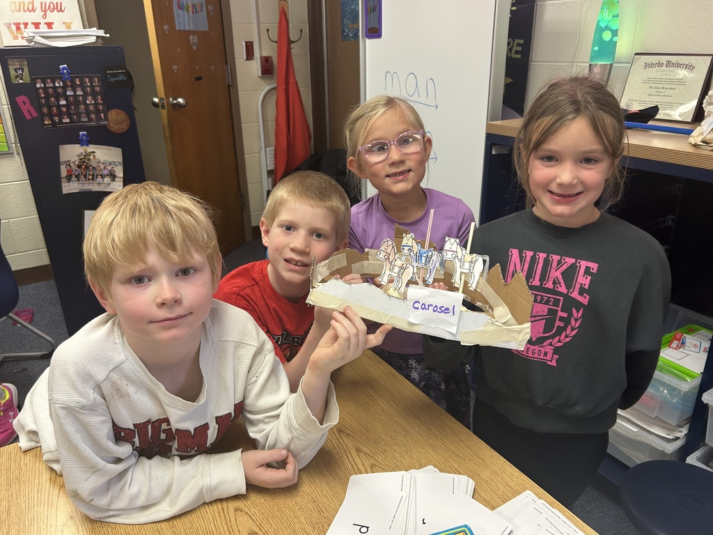 First Grade Kids building carousel project