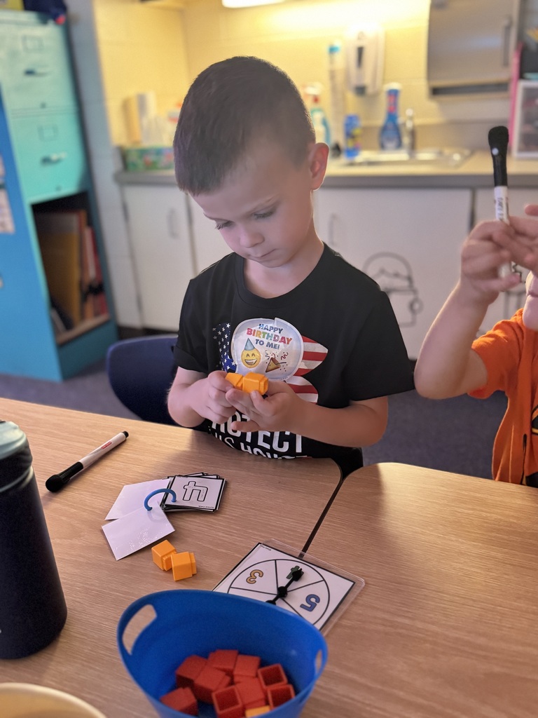 Early Kindergarteners working in class