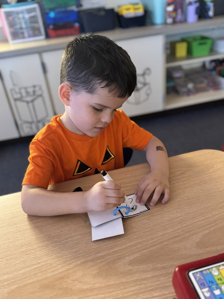 Early Kindergarteners working in class