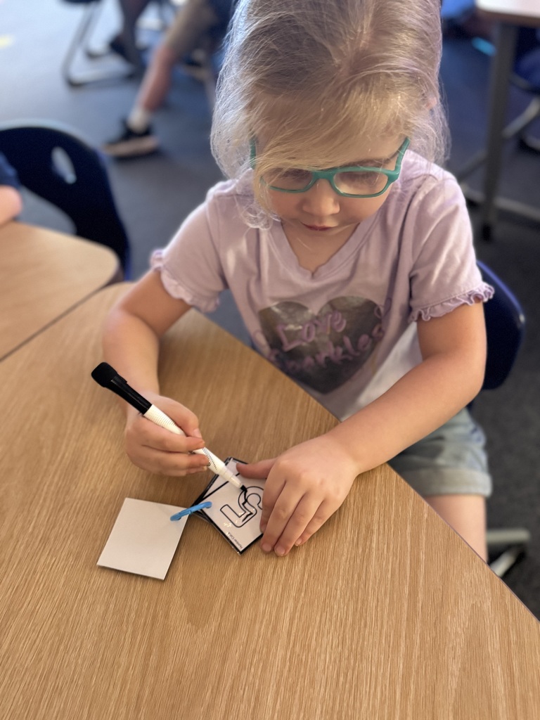 Early Kindergarteners working in class