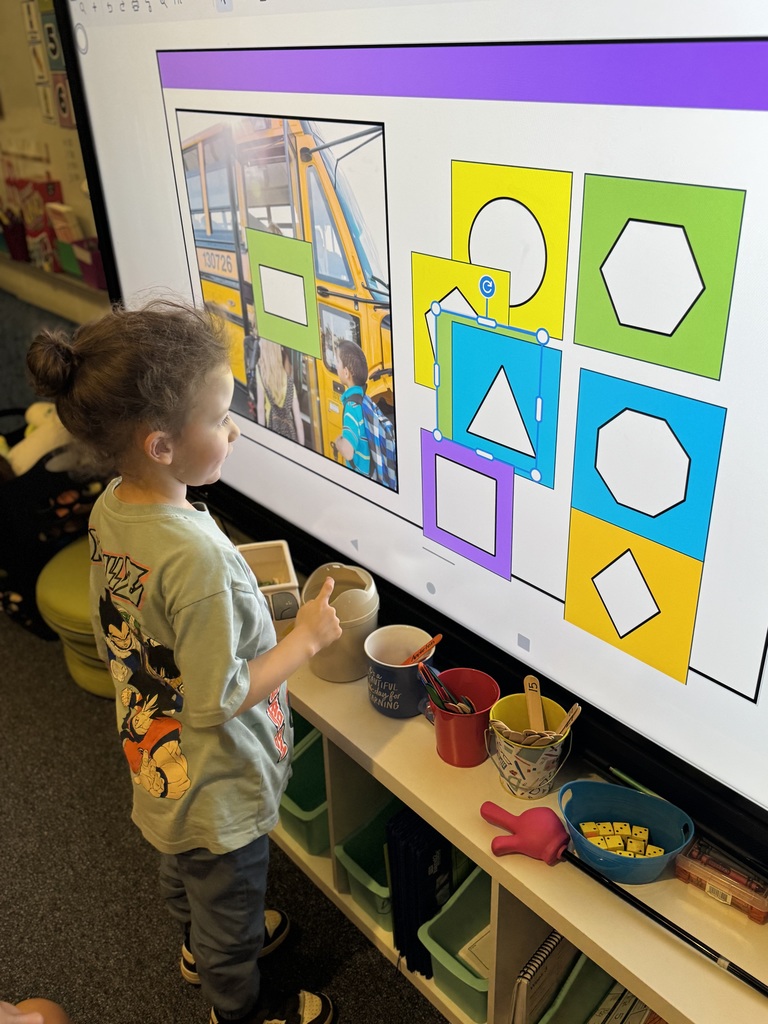 Early Kindergarteners working in class