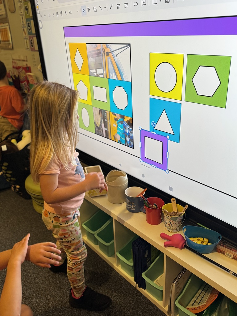 Early Kindergarteners working in class