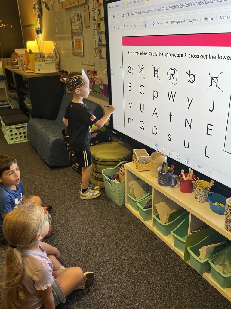 Early Kindergarteners working in class