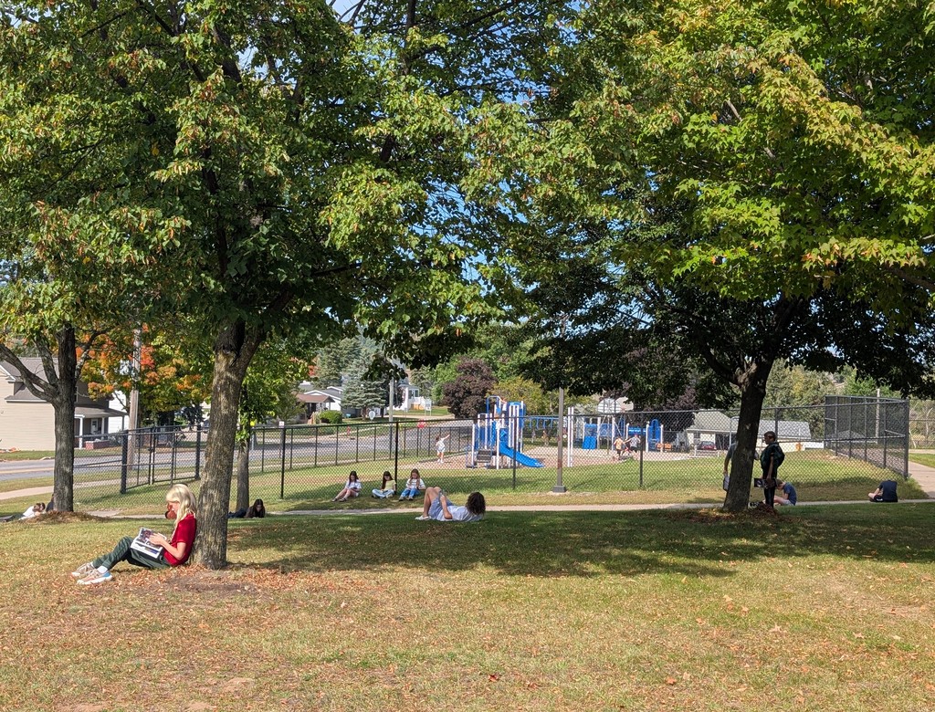 Mr. Perry's Class reading outside