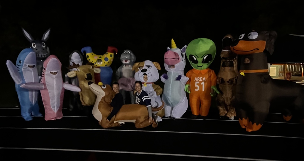 Staff in inflatable costumes