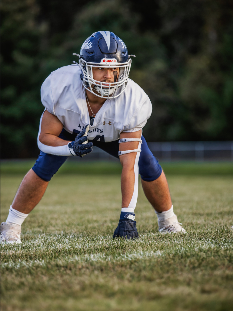 offensive line all state 1st team player on football field