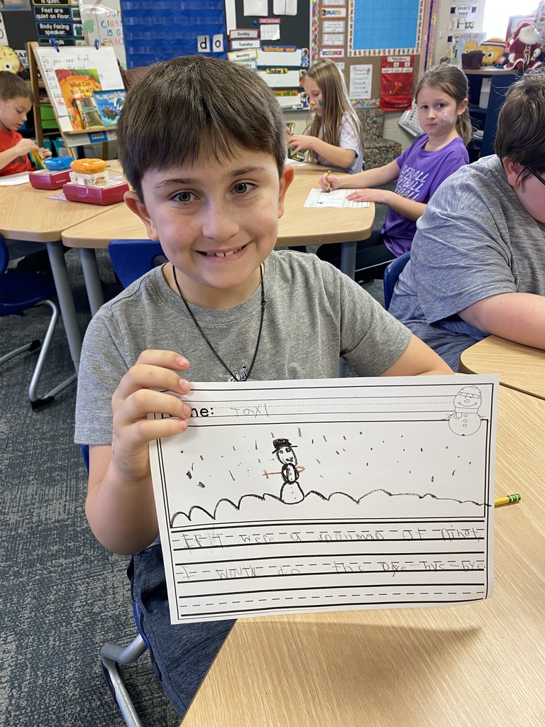 student with a story and image of a snowman