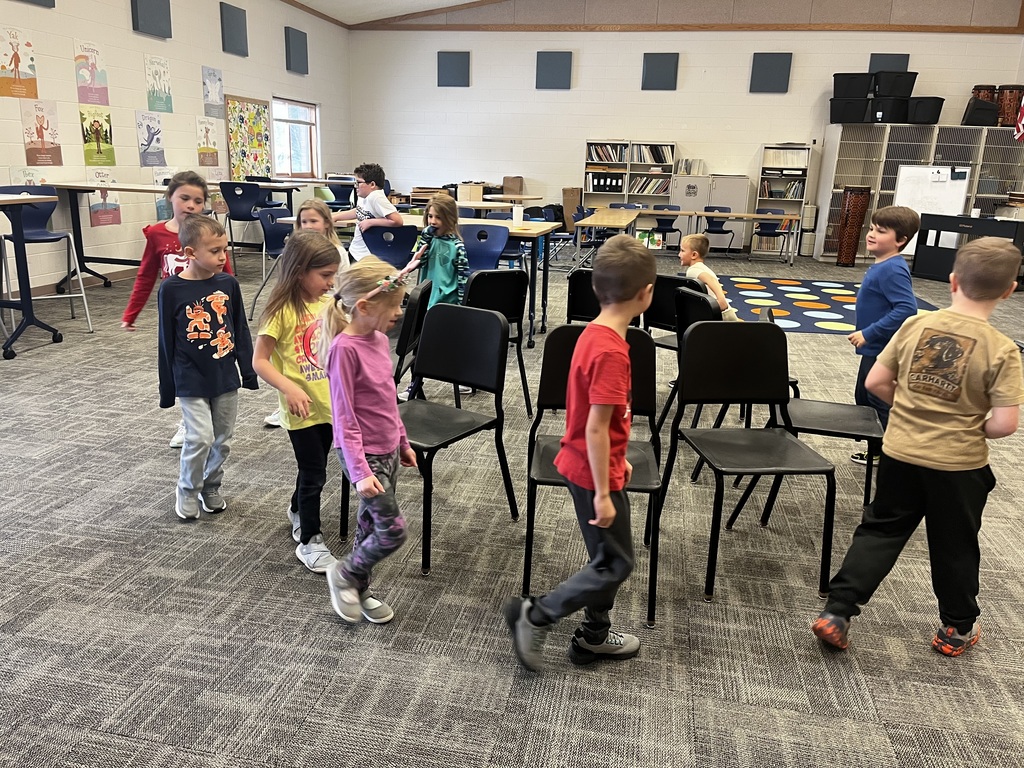 students playing musical chairs
