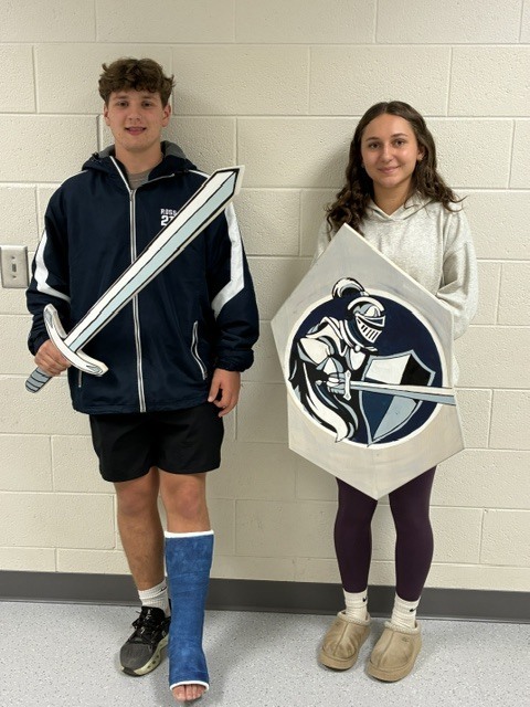 Image of a boy and girl student athlete winners.