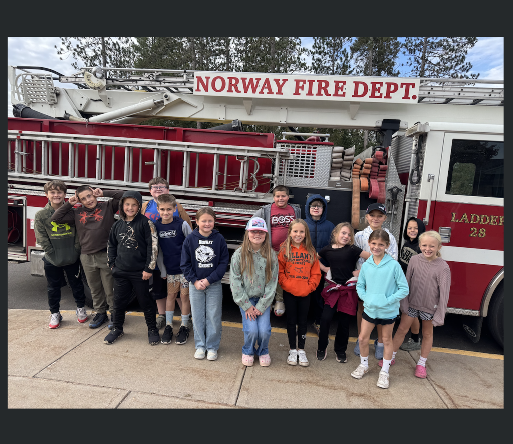 Third grade students at the fire truck