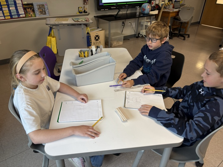 discussing and drawing plans