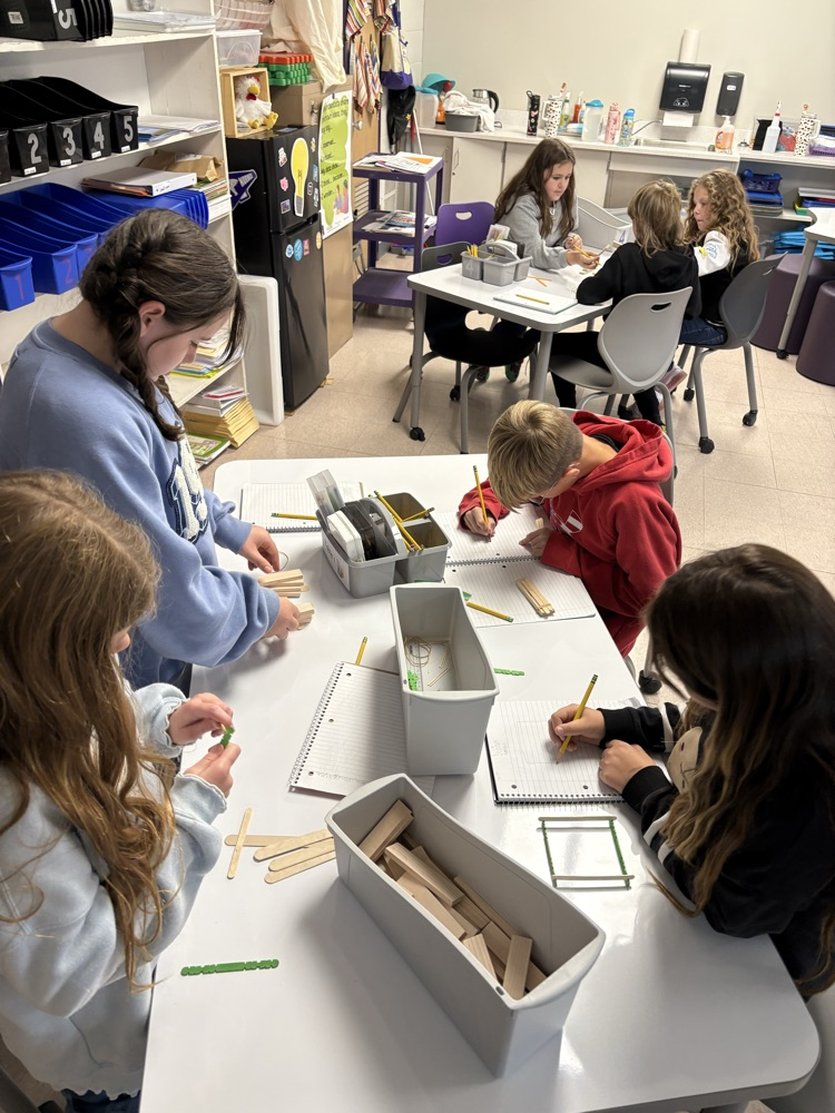 working on exploring with building materials and writing ideas