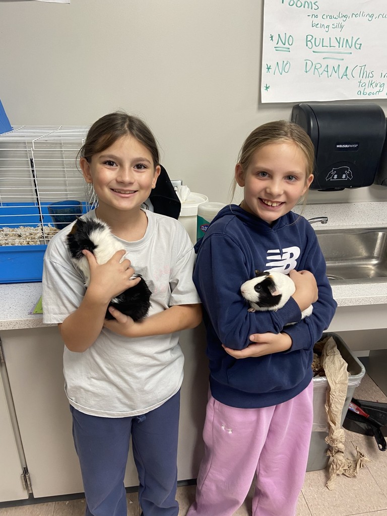 Abbi with Tinsel and Amelia with Percy