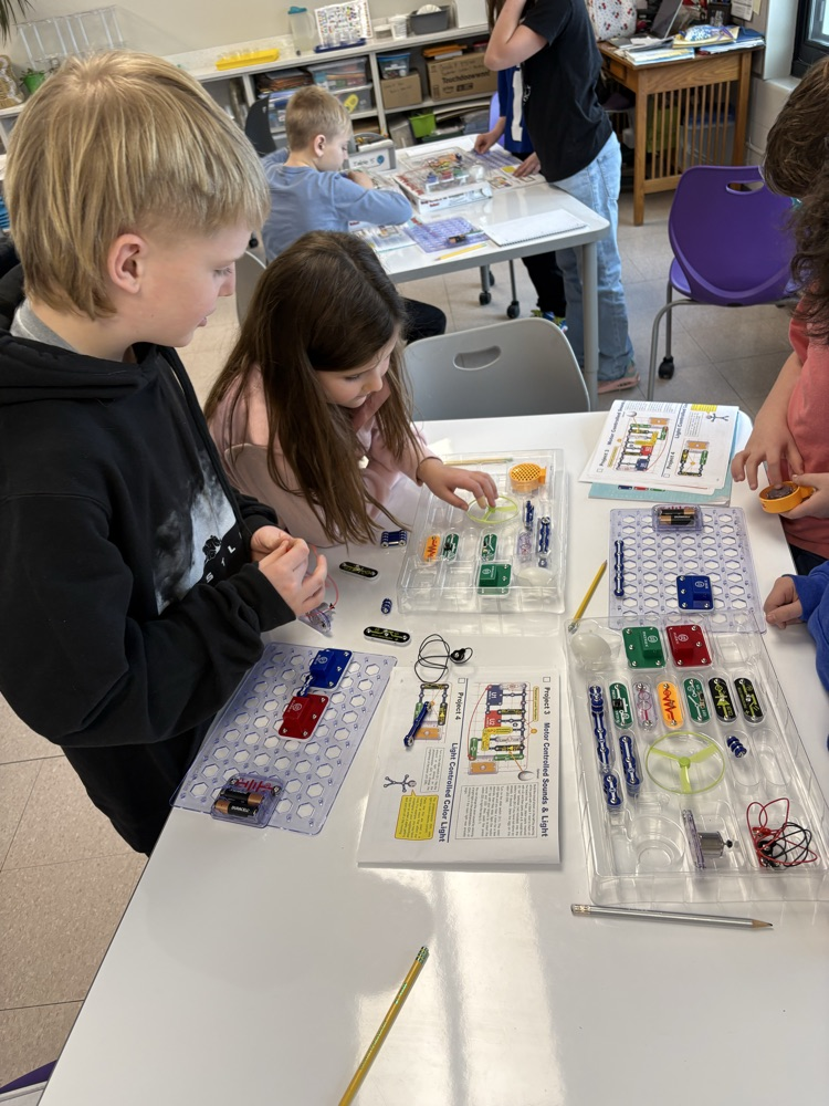 students discussing steps