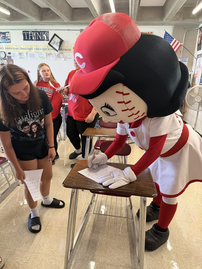 Rosie Red participating in a "Get to Know You" Activity with students.