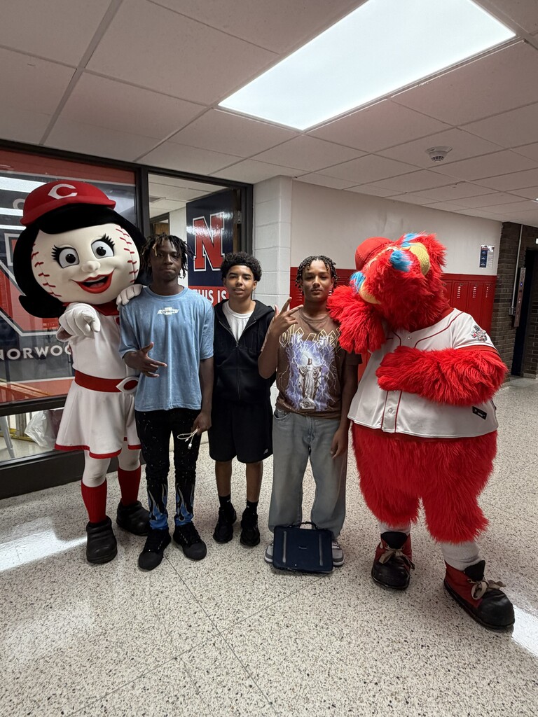 Students posing with Rosie Red and Gapper