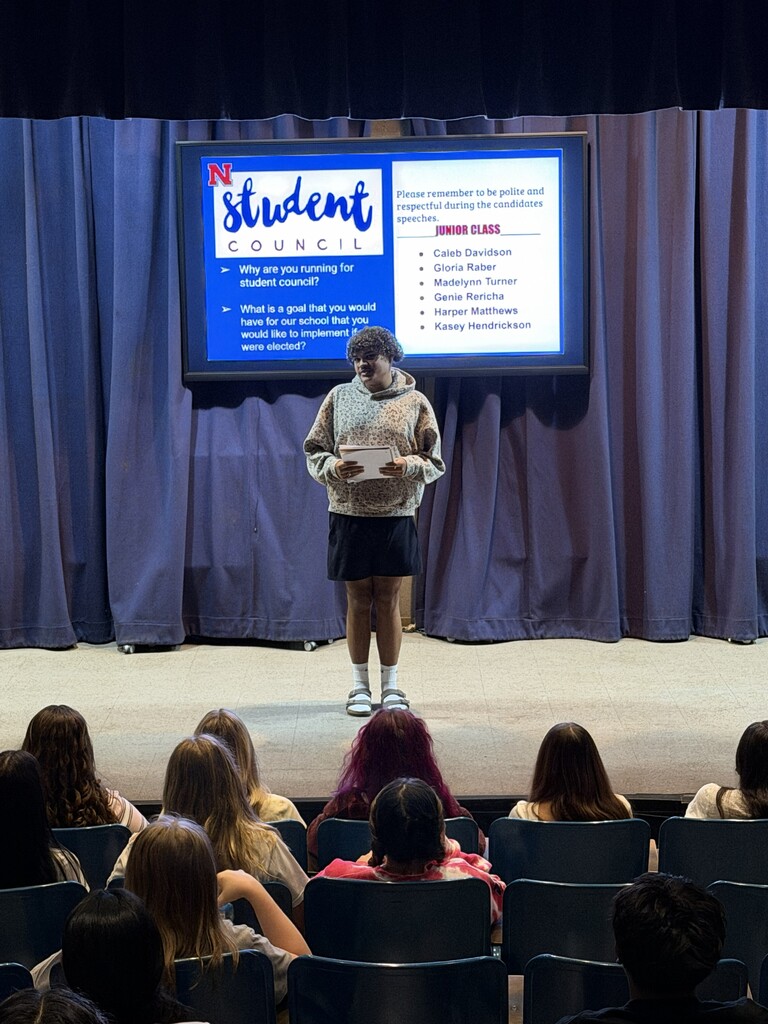 Student giving speech for Student Council.