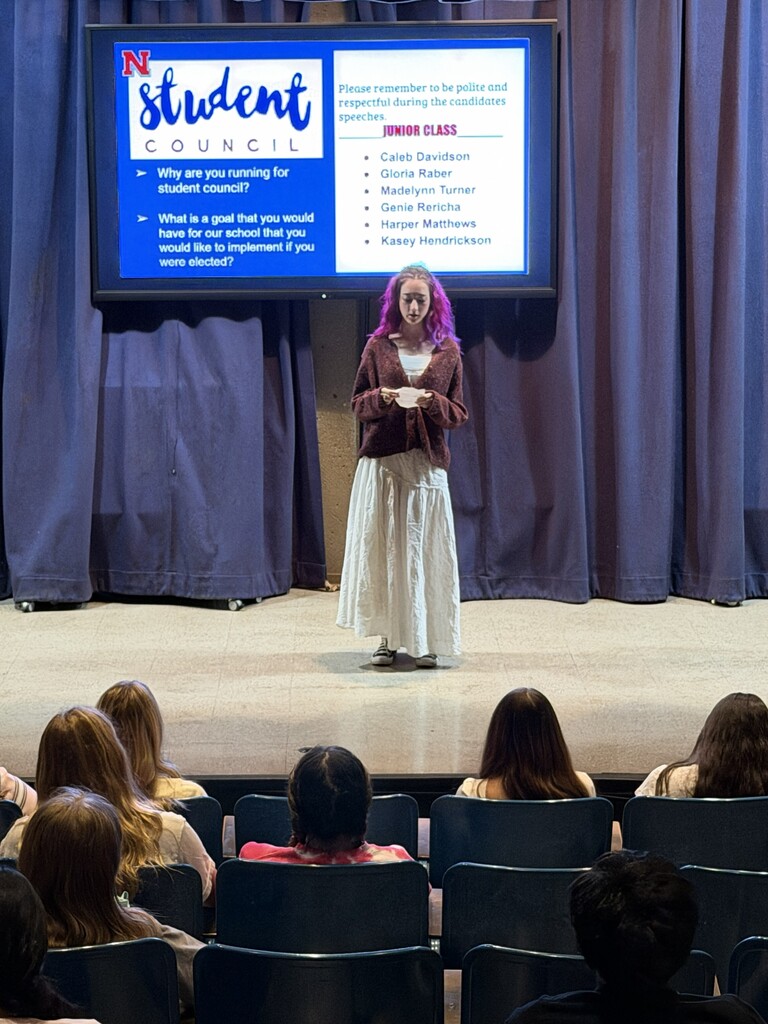 Student giving speech for Student Council.