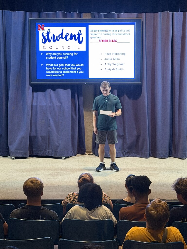 Student giving speech for Student Council.