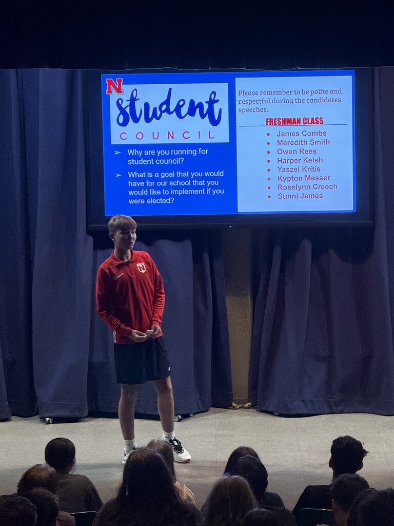 Student giving speech for Student Council.